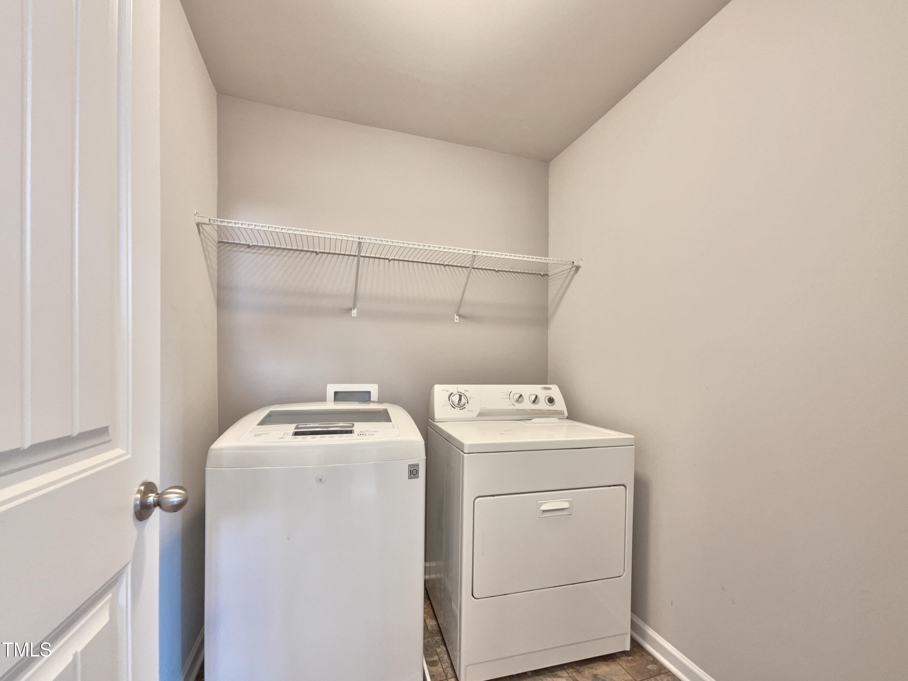 7828 Weathered Oak Way Raleigh, NC 27616 - Photo 19 of 22 a utility room with dryer and washer