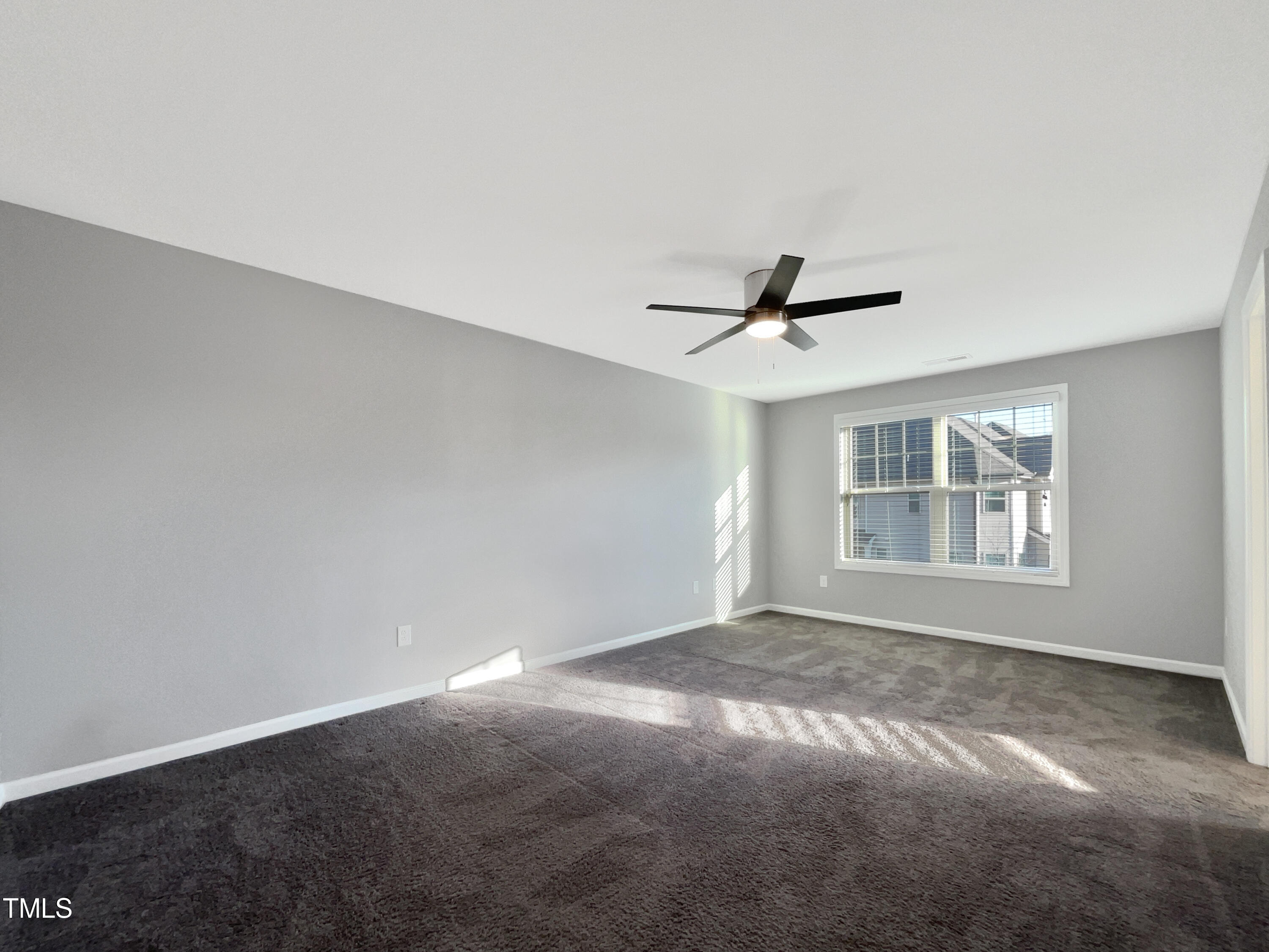 7828 Weathered Oak Way Raleigh, NC 27616 - Photo 20 of 22 a view of an empty room with a window