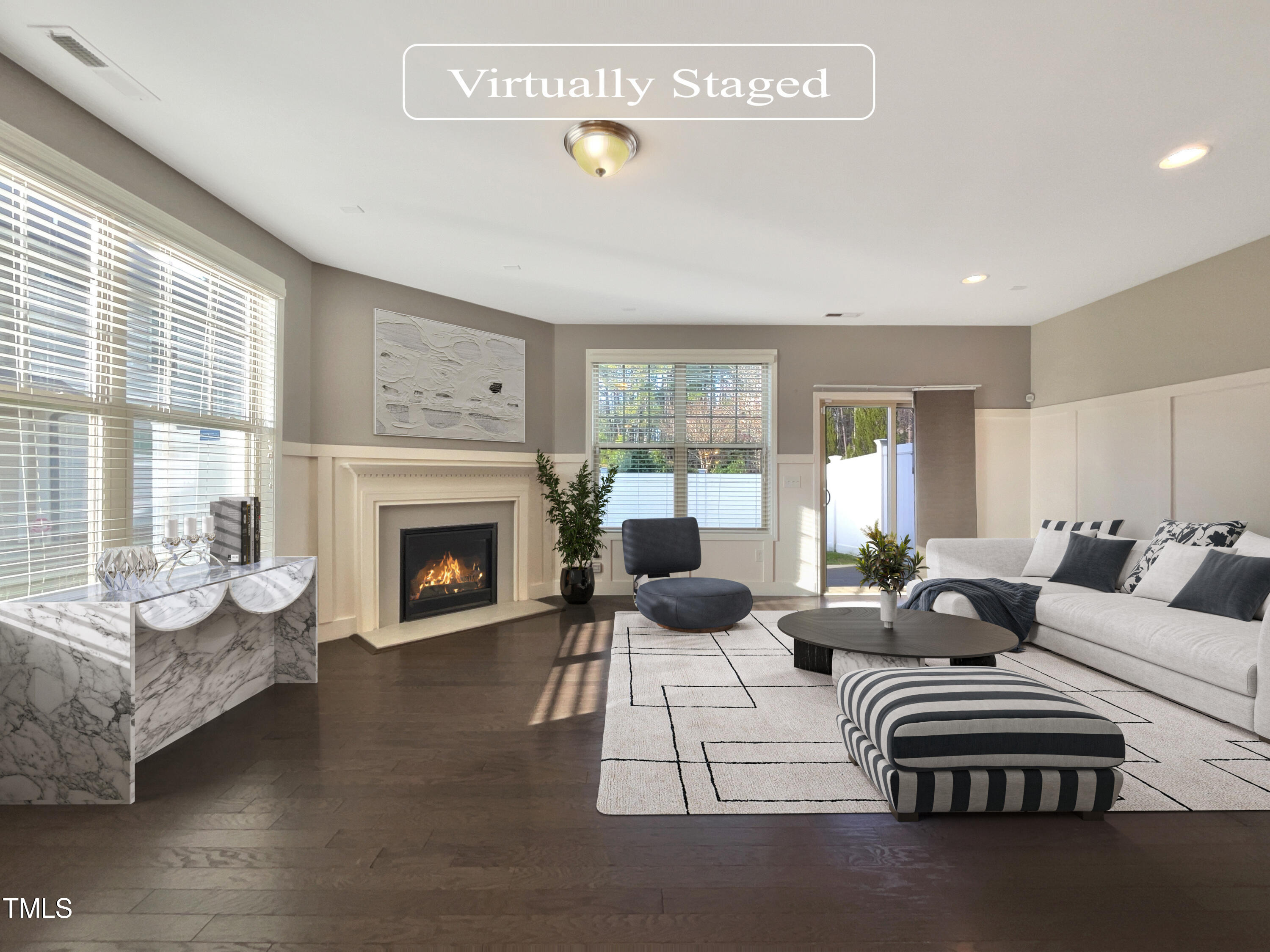 7828 Weathered Oak Way Raleigh, NC 27616 - Photo 2 of 22 a living room with furniture and a fireplace