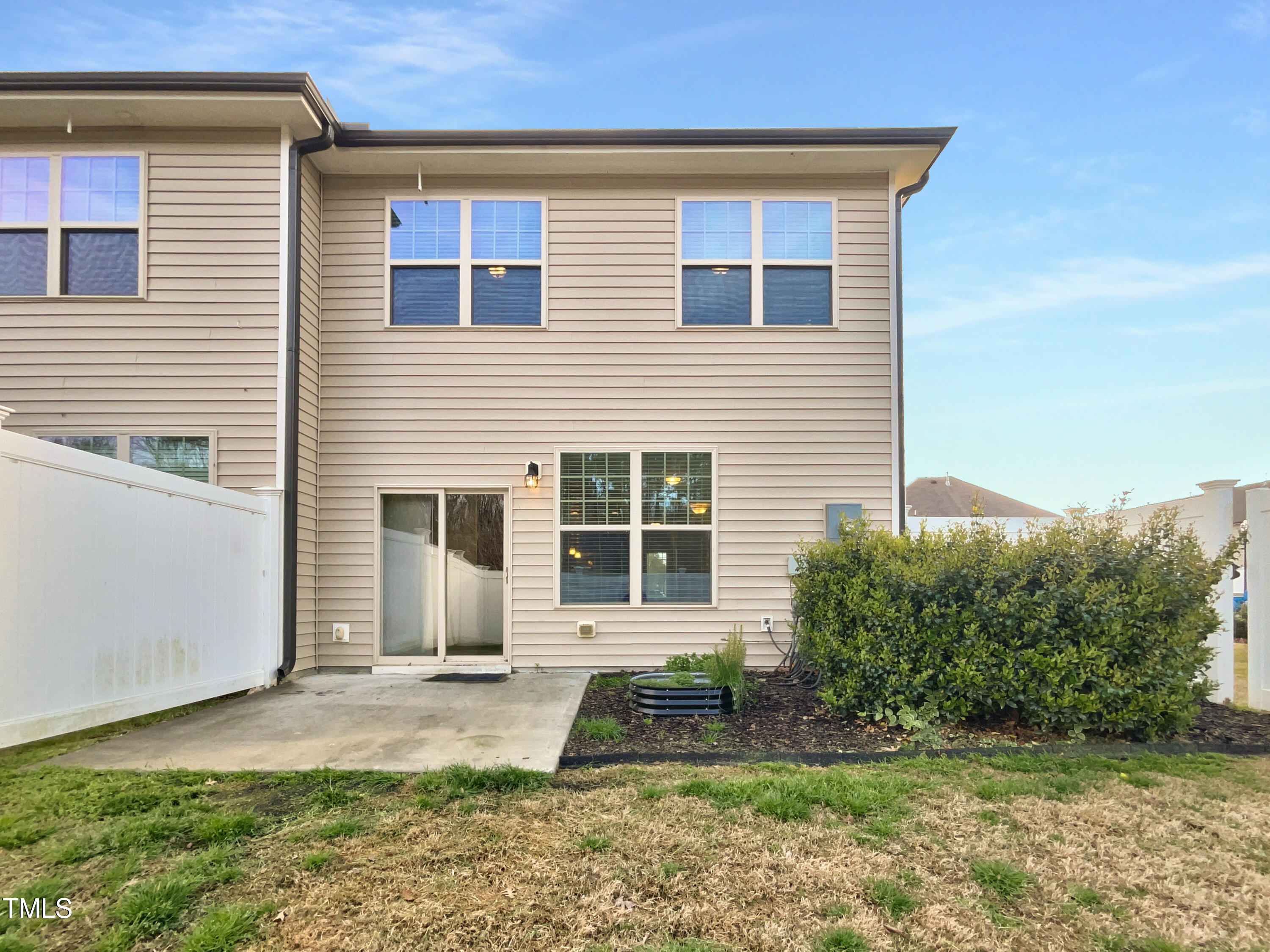 7828 Weathered Oak Way Raleigh, NC 27616 - Photo 7 of 22 a front view of a house with garden