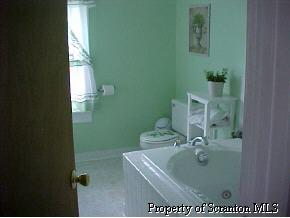 0 Rr2box2077(o Rt11) Hallstead, PA 18822 - Photo 6 of 6 a bathroom with a sink toilet and shower