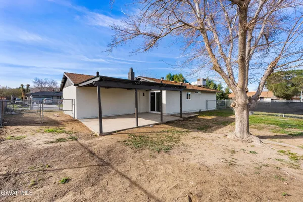 a house view with a yard