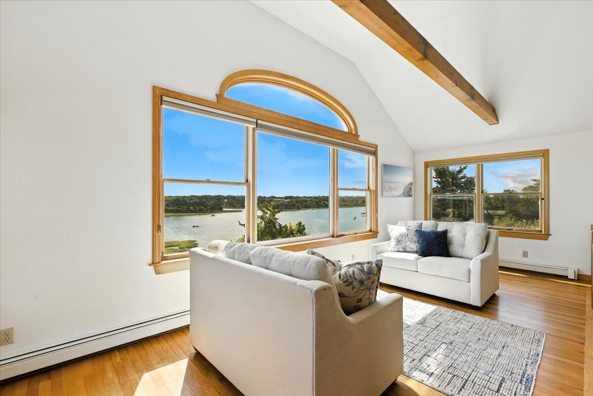 60 Smith Heights Way Eastham, MA 02642 - Photo 19 of 70 a living room with furniture and large window