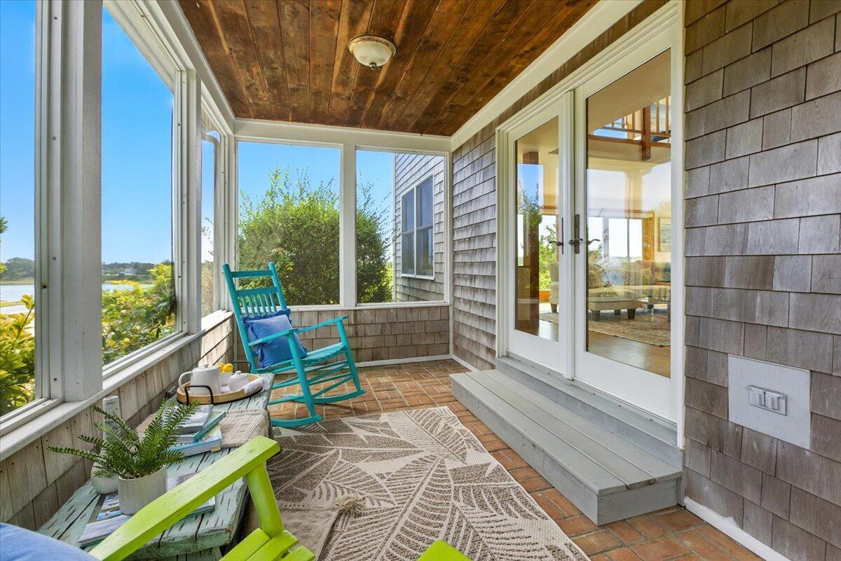 60 Smith Heights Way Eastham, MA 02642 - Photo 27 of 70 a view of a two chair in the balcony