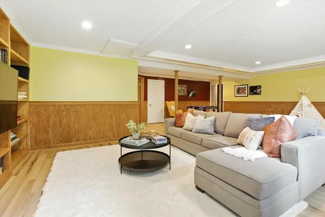 a living room with furniture and a table