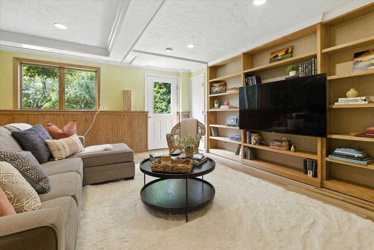 60 Smith Heights Way Eastham, MA 02642 - Photo 37 of 70 a living room with furniture and a flat screen tv