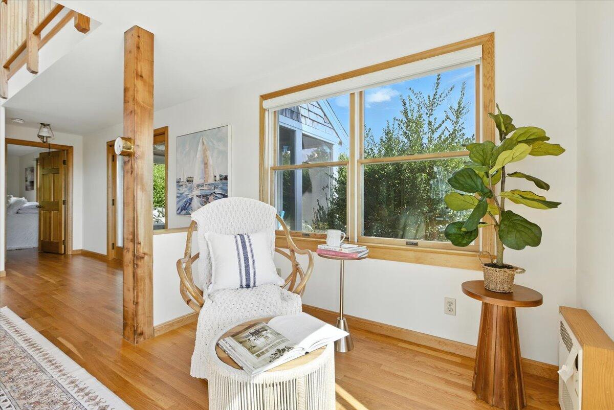 60 Smith Heights Way Eastham, MA 02642 - Photo 42 of 70 a living room with furniture and a large window