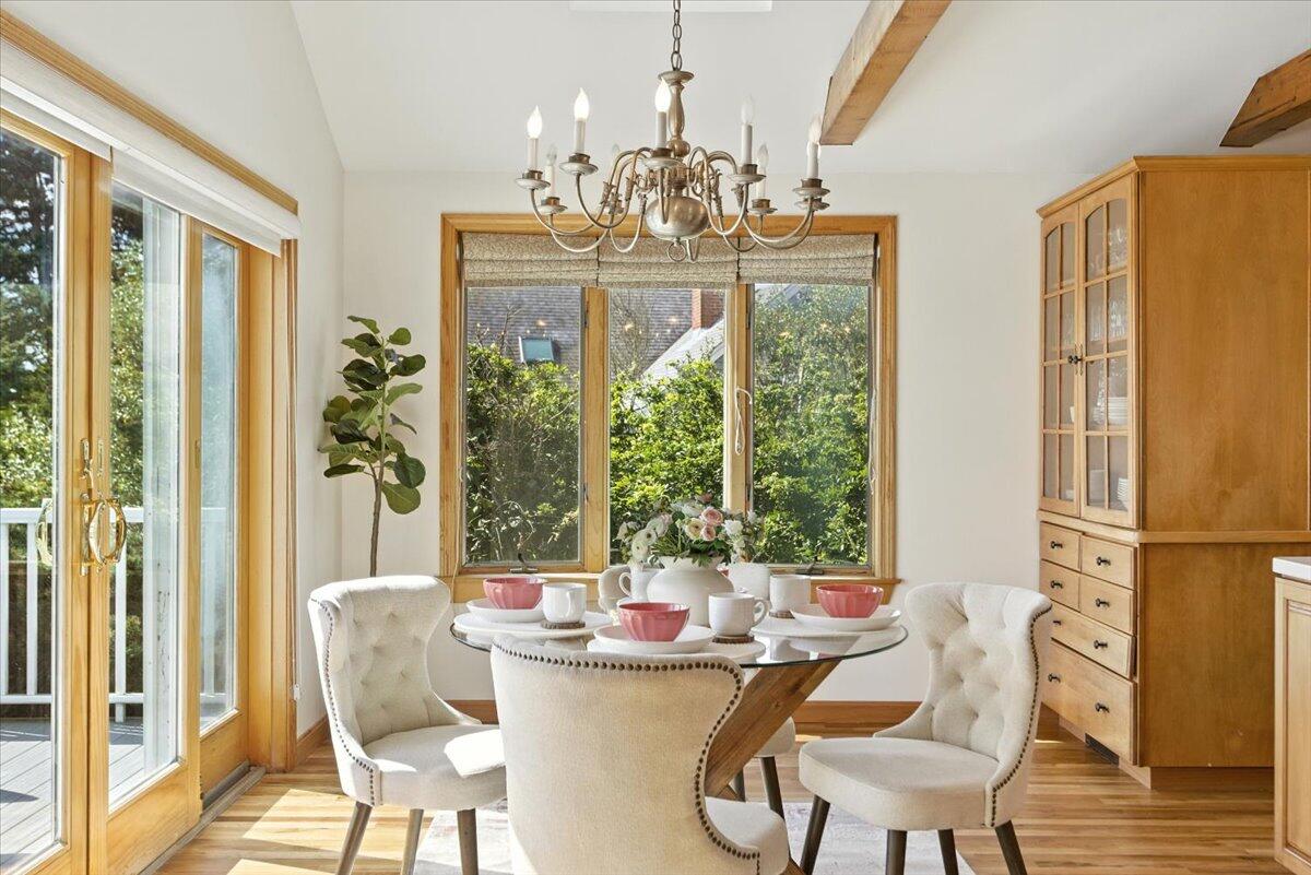 60 Smith Heights Way Eastham, MA 02642 - Photo 43 of 70 a view of a dining room with furniture window and outside view