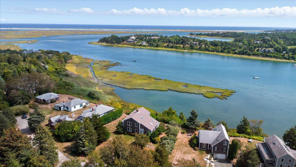 60 Smith Heights Way Eastham, MA 02642 - Photo 5 of 70 an aerial view of ocean and residential houses with outdoor space