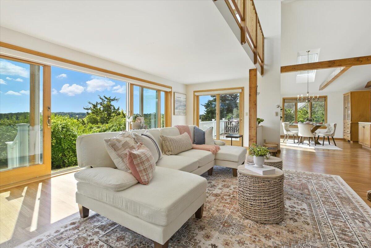 60 Smith Heights Way Eastham, MA 02642 - Photo 65 of 70 a living room with furniture and a large window