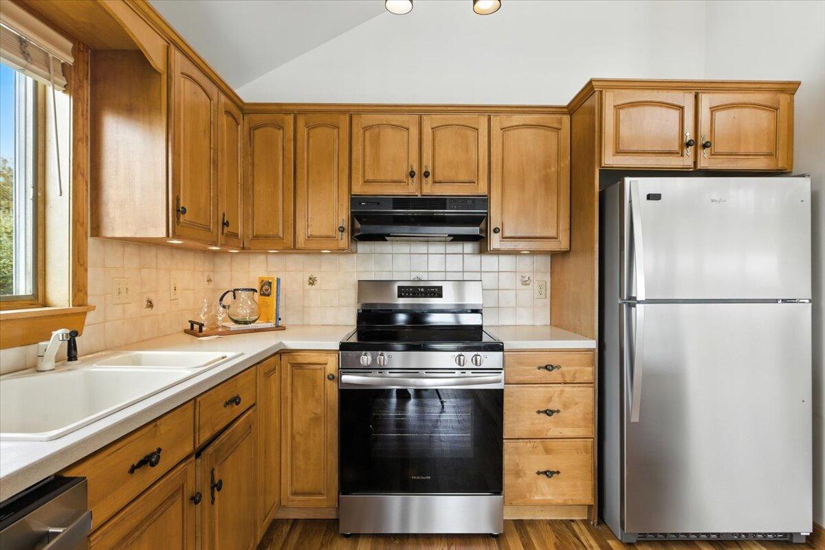 60 Smith Heights Way Eastham, MA 02642 - Photo 70 of 70 a kitchen with a refrigerator stove and sink