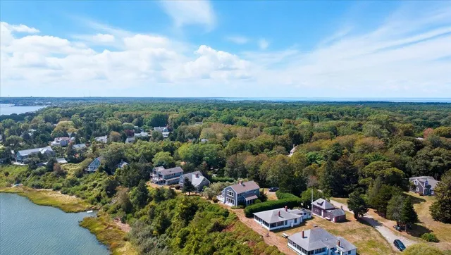 an aerial view of a house with a garden