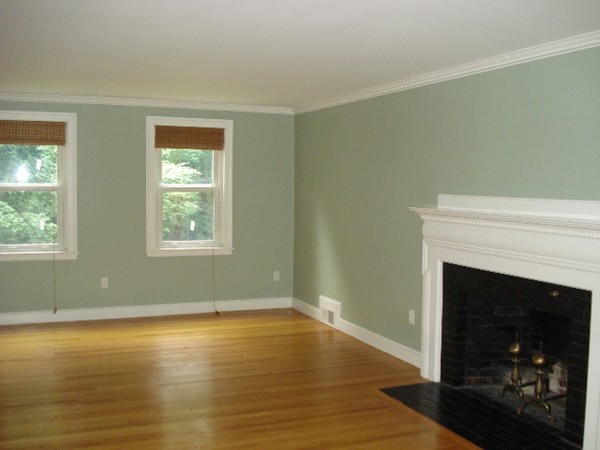 116 Edmunds Road Wellesley, MA 02481 - Photo 3 of 14 a view of empty room with wooden floor and fireplace