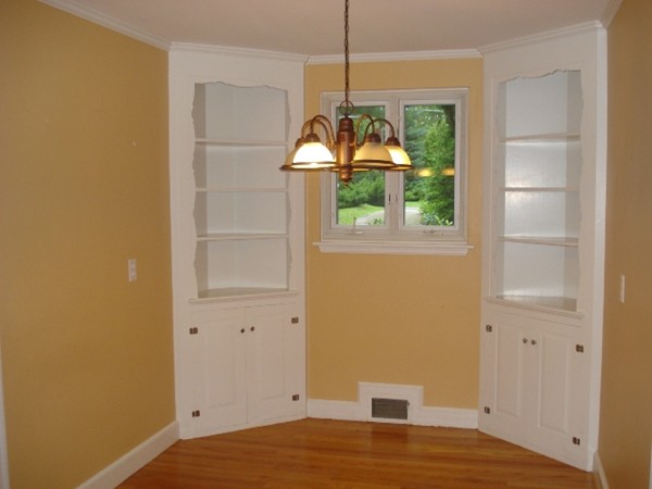 116 Edmunds Road Wellesley, MA 02481 - Photo 8 of 14 a bedroom with a bed and a window