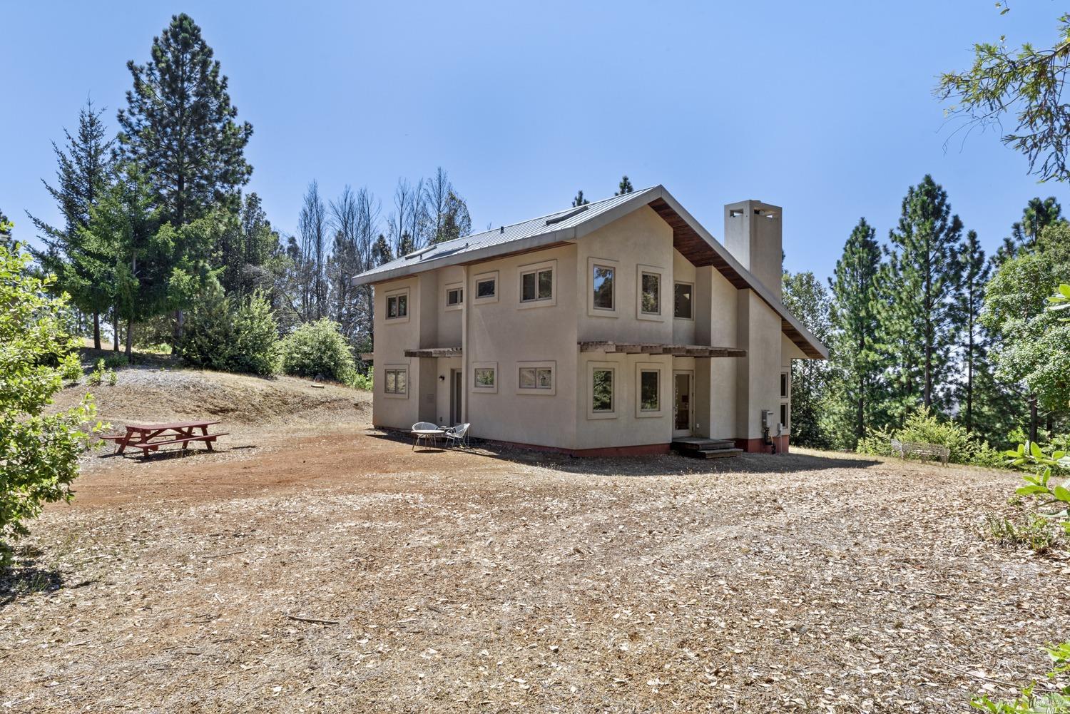 3559 Creighton Ridge Road Cazadero, CA 95421 - Photo 1 of 1 a view of a house with a yard covered in snow