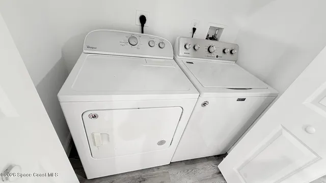 a utility room with dryer and washer