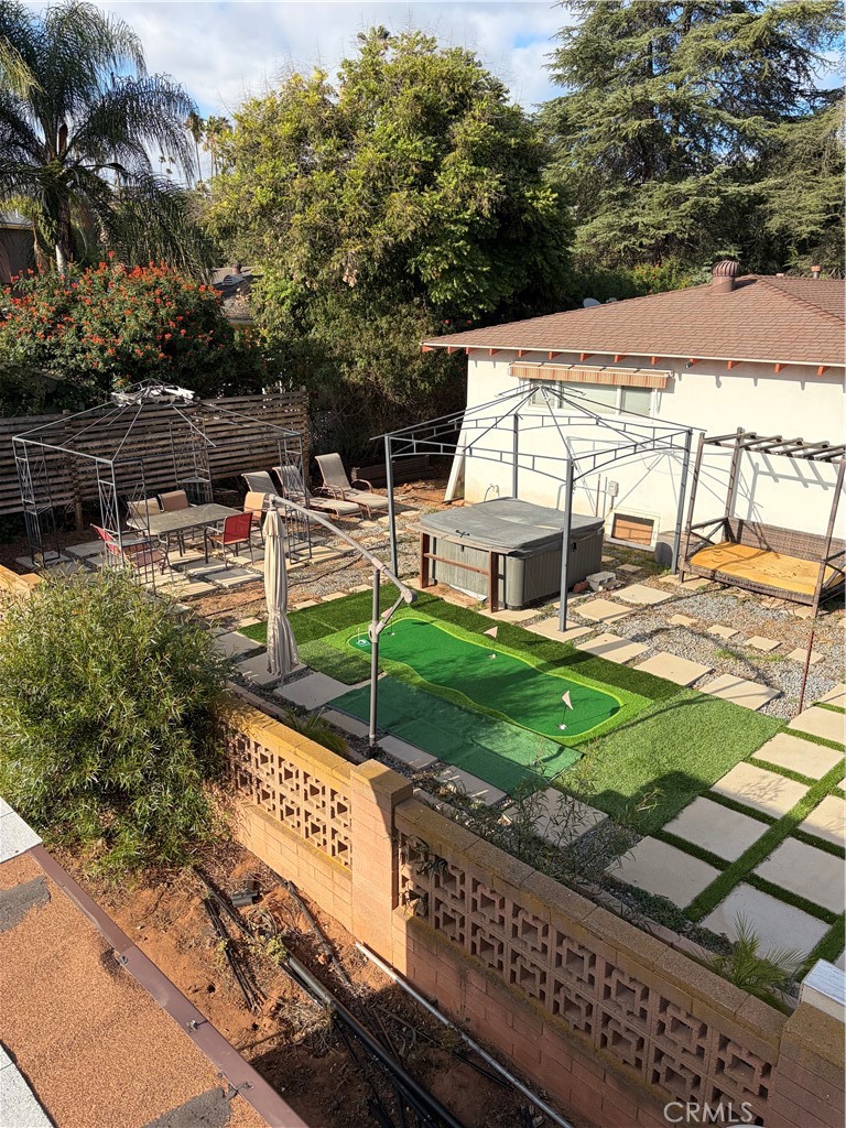 646 El Rancho Drive El Cajon, CA 92019 - Photo 18 of 23 a view of a backyard with sitting area