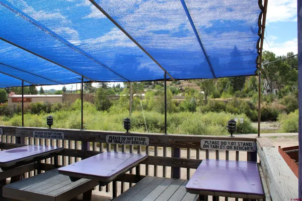 a view of a chairs on the roof deck