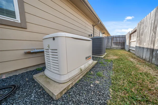 a view of a back yard of the house