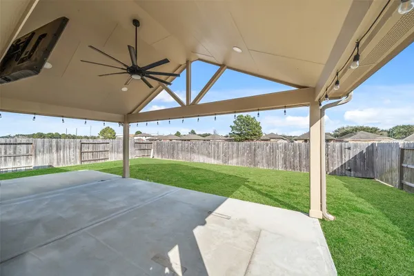 a view of backyard with green space