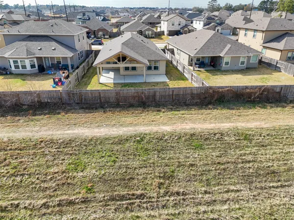 a aerial view of a house with swimming pool