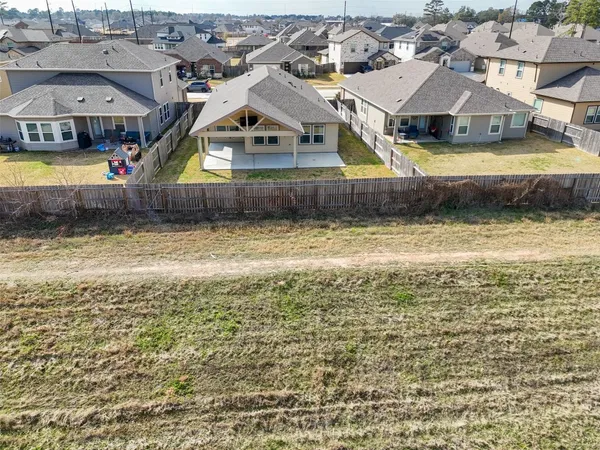 a aerial view of a house with swimming pool