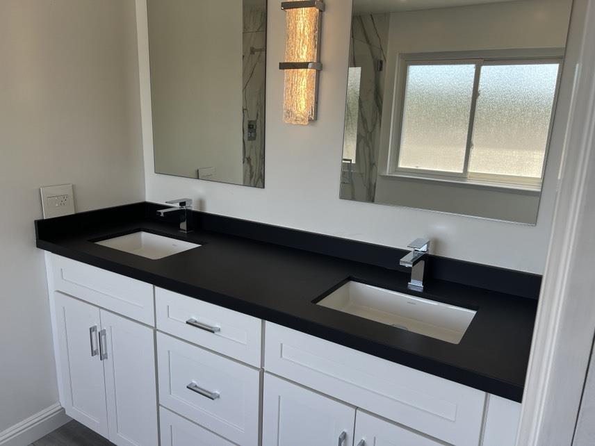 5 Maple Way San Carlos, CA 94070 - Photo 12 of 21 a bathroom with a sink and a mirror