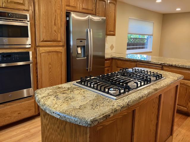 5 Maple Way San Carlos, CA 94070 - Photo 4 of 21 a kitchen with a stove and a refrigerator