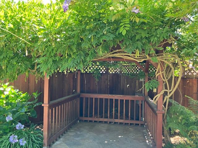 5 Maple Way San Carlos, CA 94070 - Photo 8 of 21 a view of a pathway of a garden