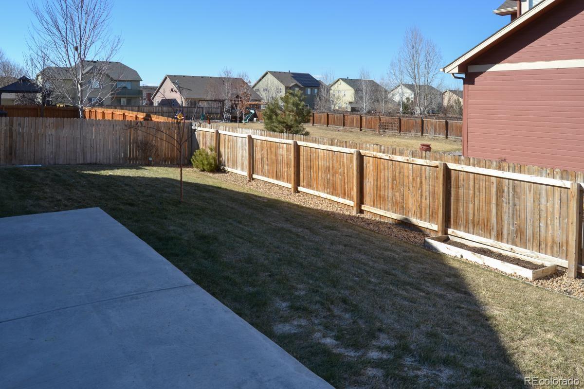 8039 Raspberry Drive Frederick, CO 80504 - Photo 28 of 28 a view of a houses with yard