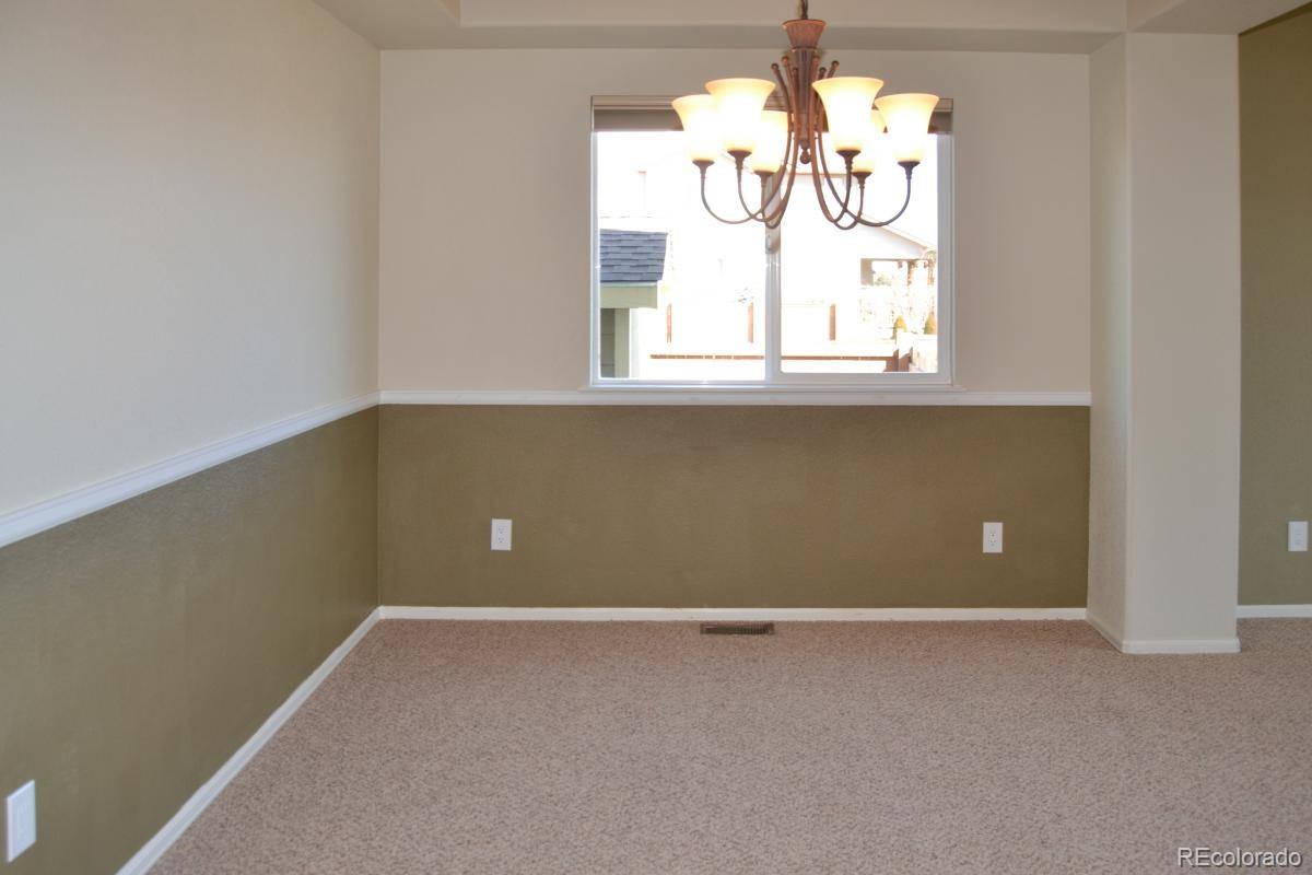 8039 Raspberry Drive Frederick, CO 80504 - Photo 6 of 28 a view of a window in a room