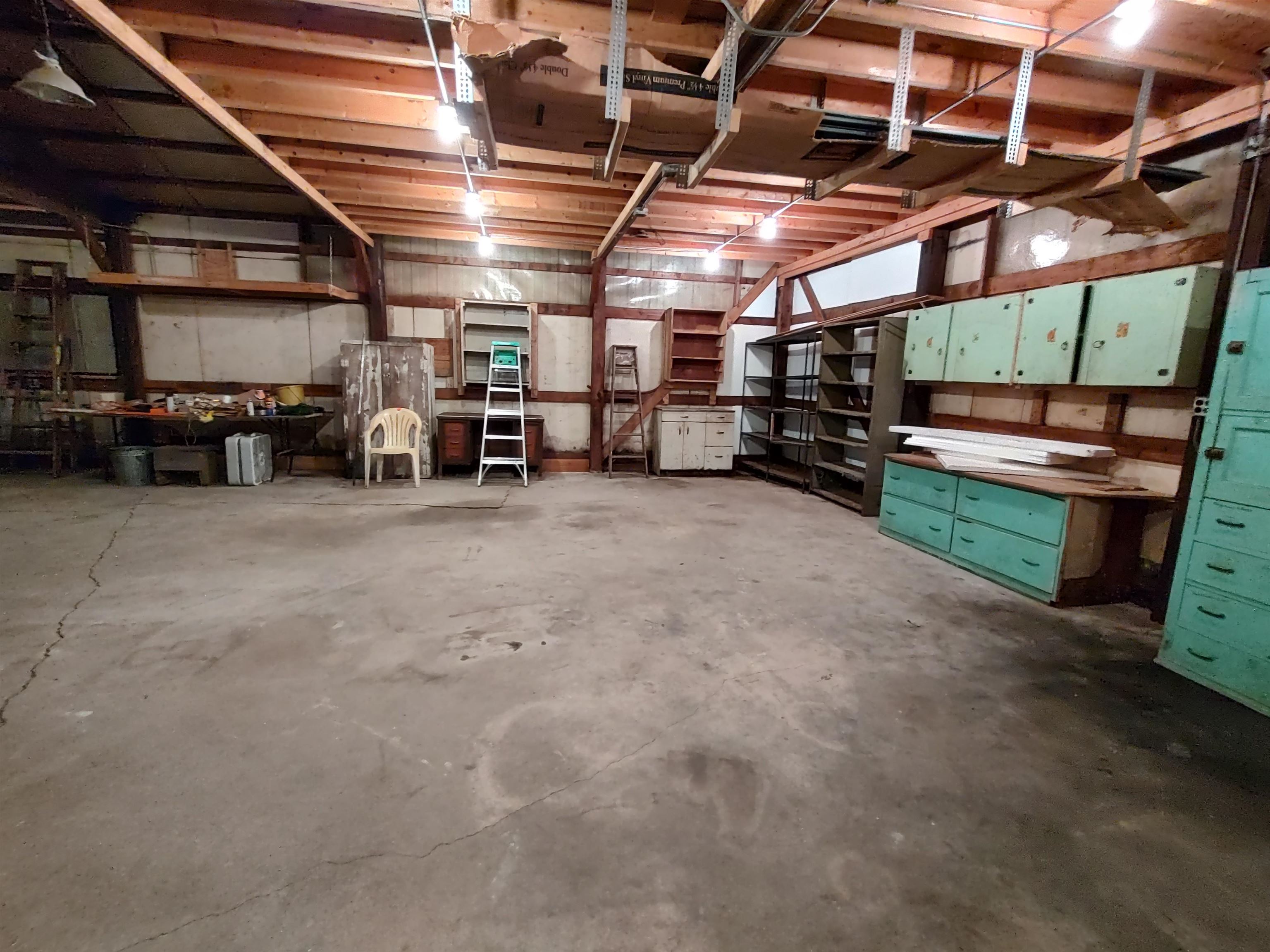 11090 Woodstock Road Garden Prairie, IL 61038 - Photo 11 of 37 a view of a garage with storage