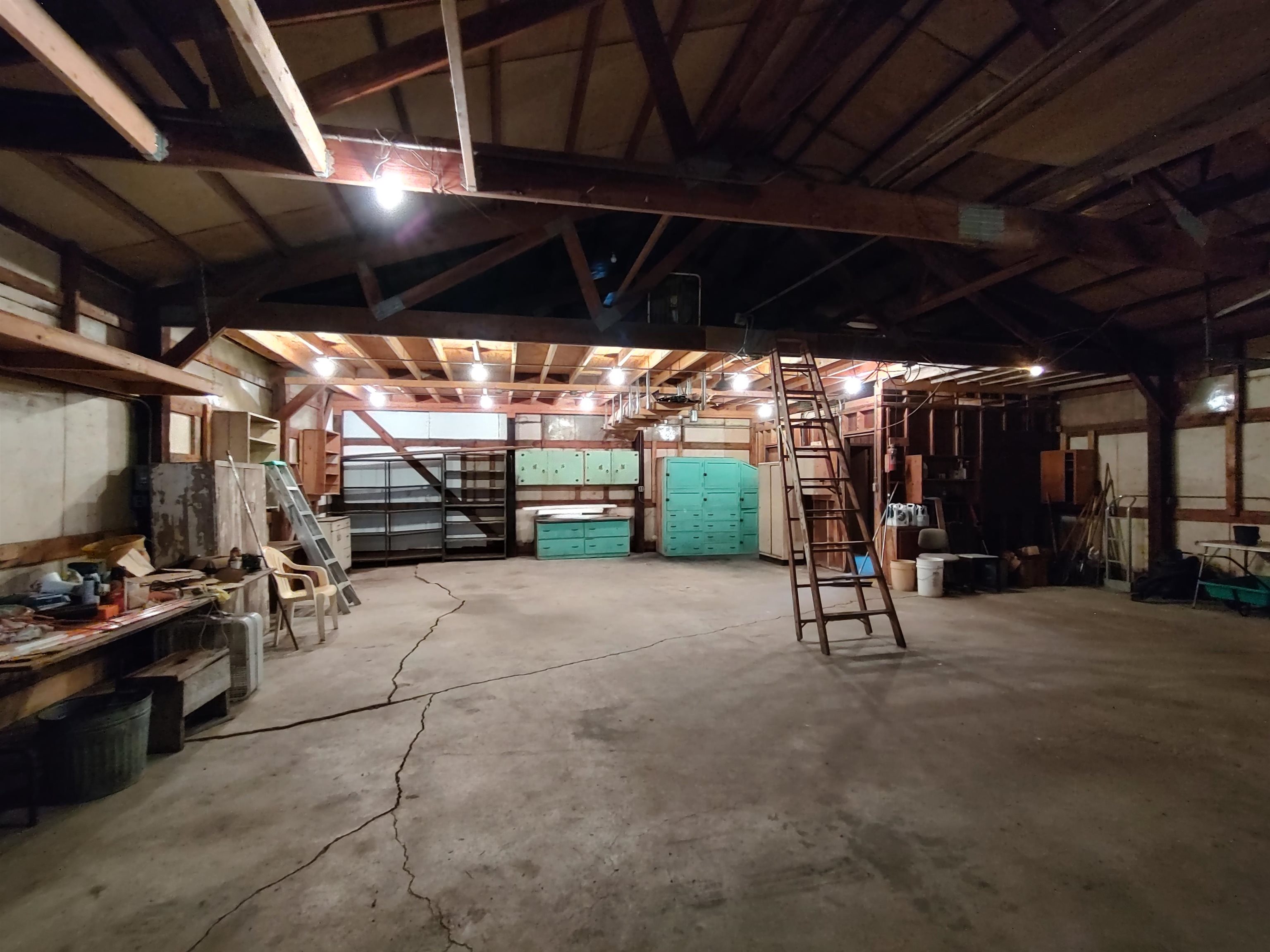11090 Woodstock Road Garden Prairie, IL 61038 - Photo 13 of 37 a view of a garage with furniture