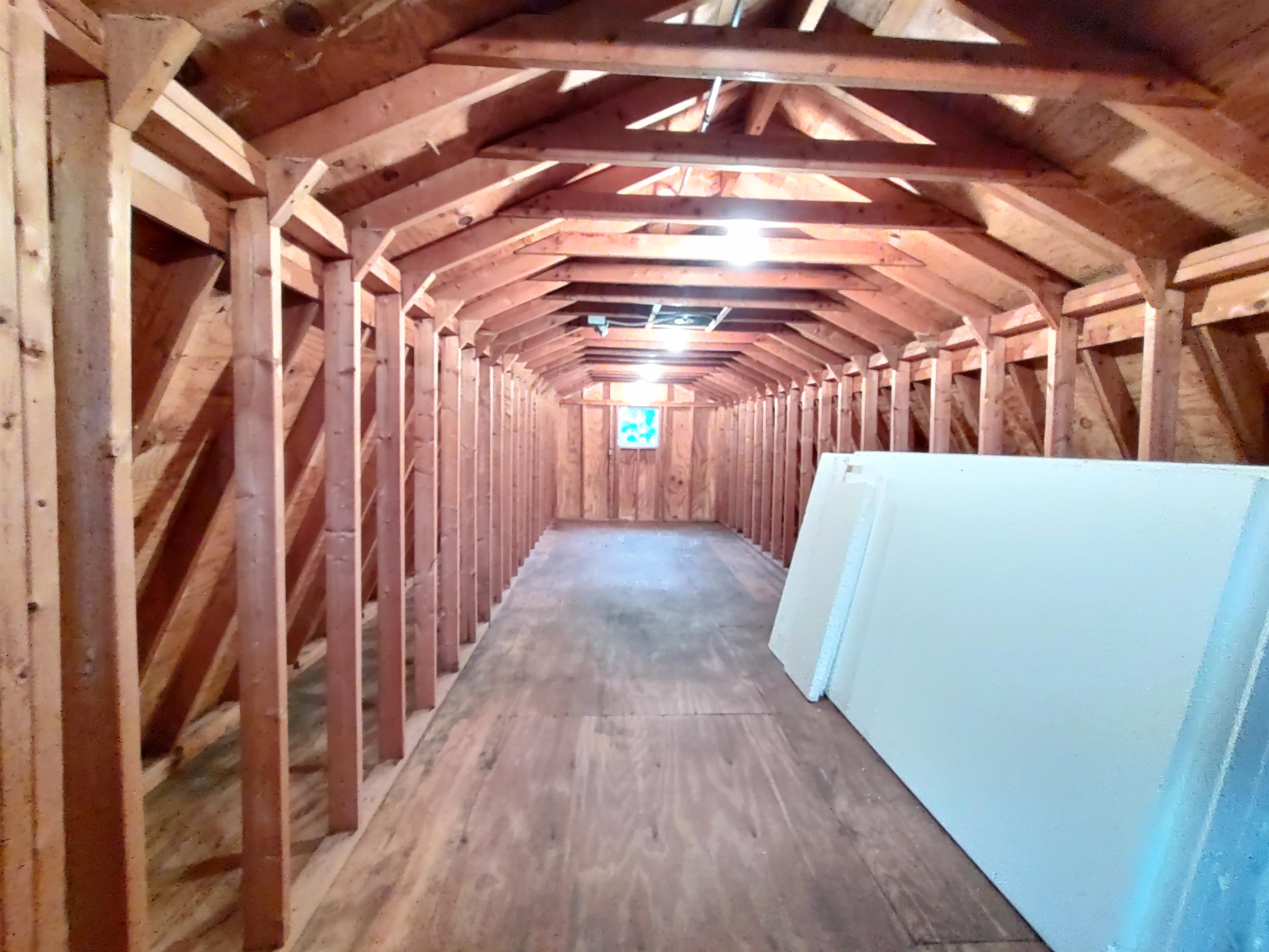 11090 Woodstock Road Garden Prairie, IL 61038 - Photo 19 of 37 a view of a room with wooden floor