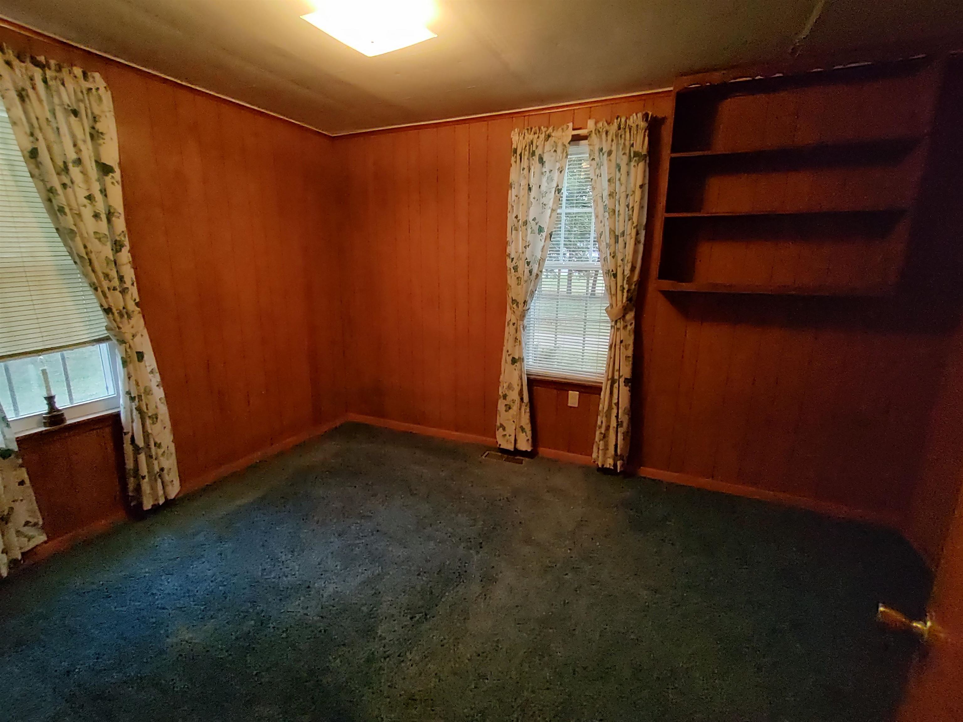 11090 Woodstock Road Garden Prairie, IL 61038 - Photo 32 of 37 a view of an empty room with a fireplace