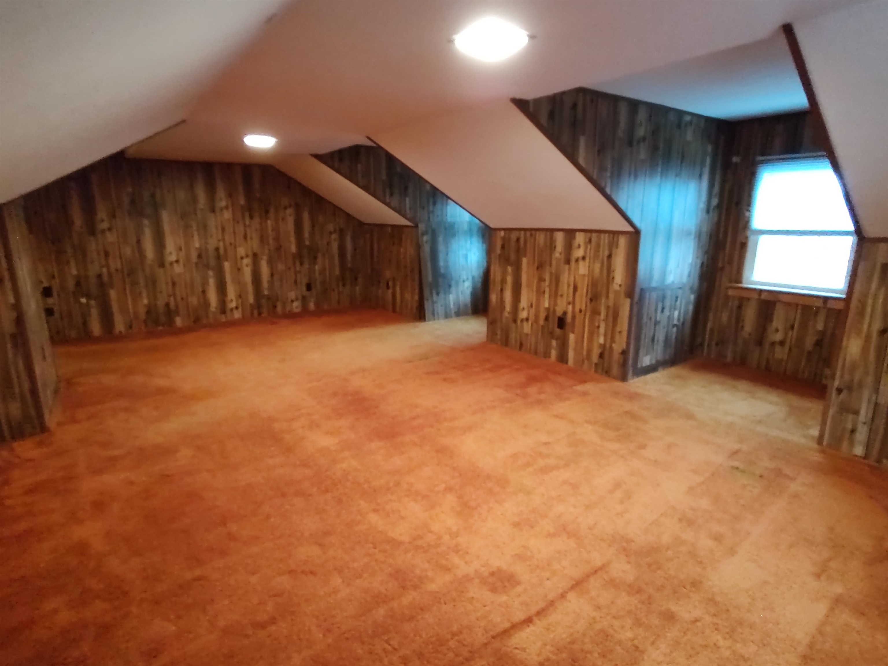 11090 Woodstock Road Garden Prairie, IL 61038 - Photo 35 of 37 a view of an empty room with wooden floor and a window