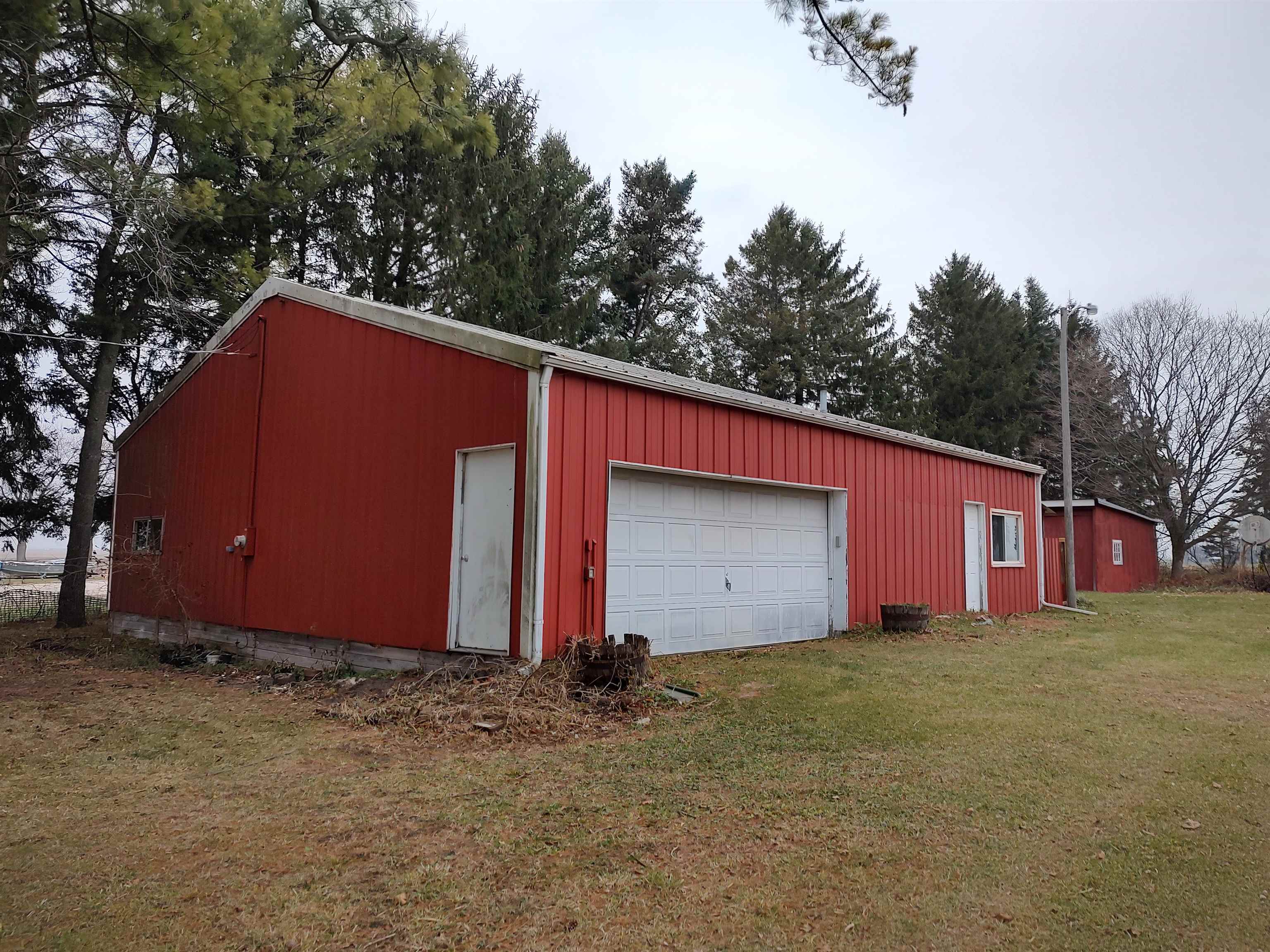 11090 Woodstock Road Garden Prairie, IL 61038 - Photo 8 of 37 a house with trees in the background