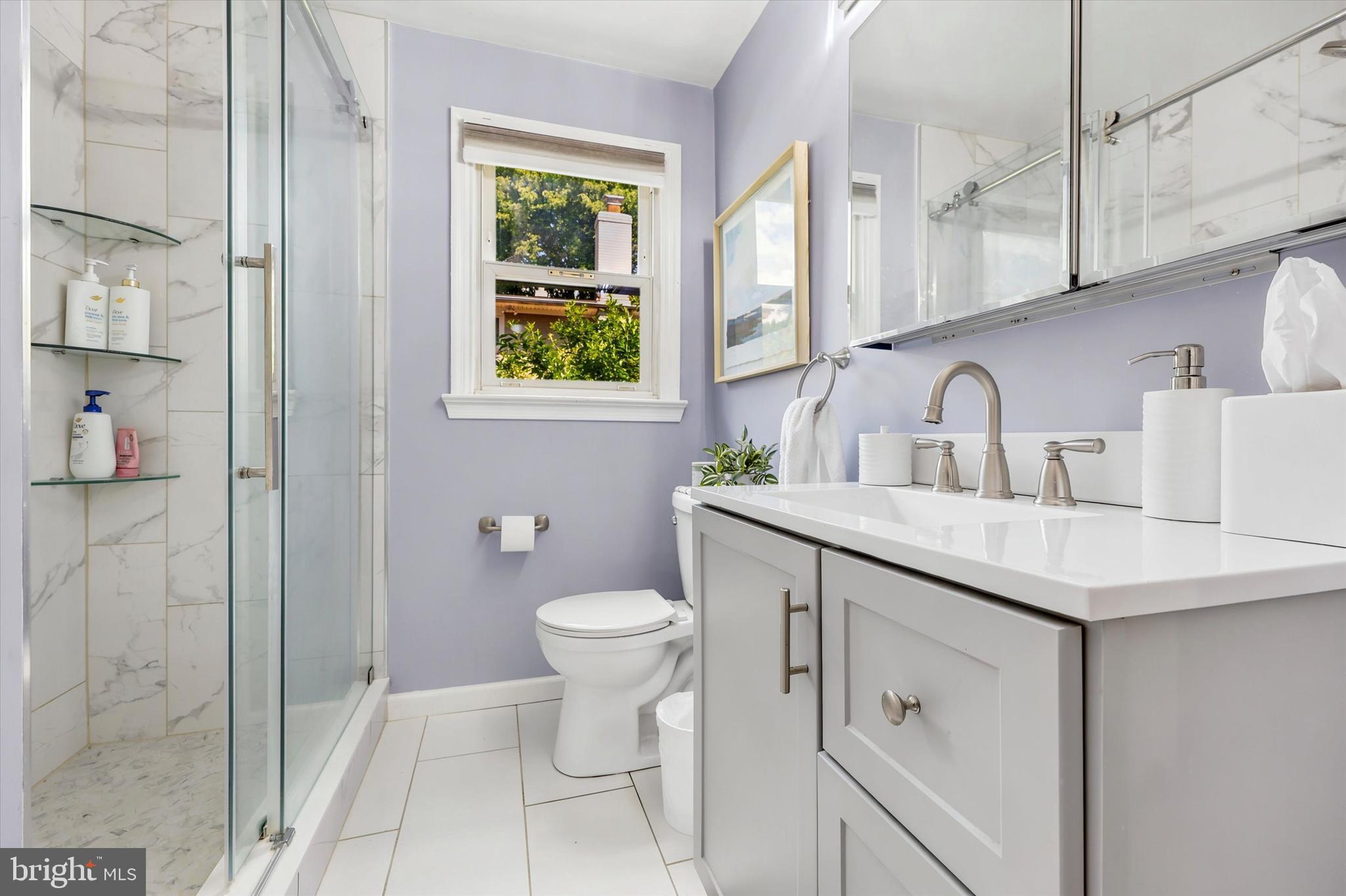 39 Haverford Road Ardmore, PA 19003 - Photo 15 of 24 a bathroom with a sink toilet and shower