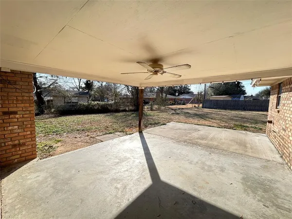 a view of a livingroom with wooden floor