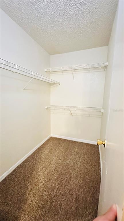 1017 South Hiawassee Road, Unit 3716 Orlando, FL 32835 - Photo 11 of 20 a view of a room with shelf on the wall