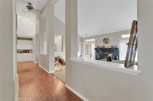 a living room with furniture fireplace and a flat screen tv
