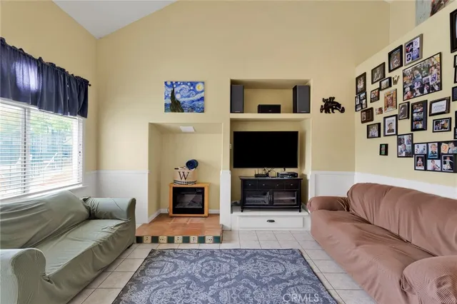 a kitchen with a sink cabinets and window
