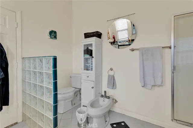 a view of a park with swings and slides