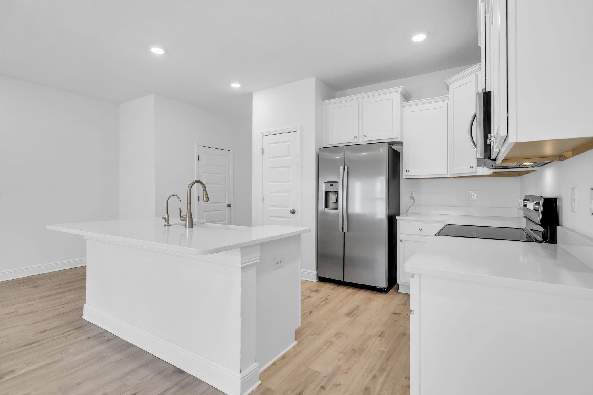 22 Redbird Loop Destin, FL 32541 - Photo 13 of 40 a kitchen with stainless steel appliances a sink and a refrigerator