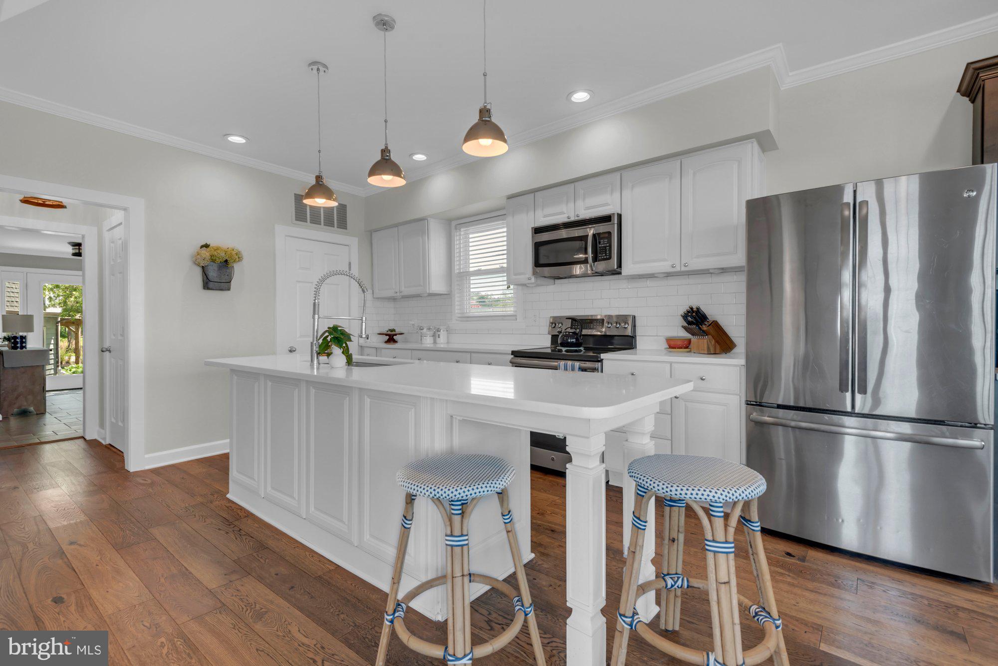 1069 Shore Acres Road Arnold, MD 21012 - Photo 17 of 69 Crisp white cabinetry & quartz-style counters