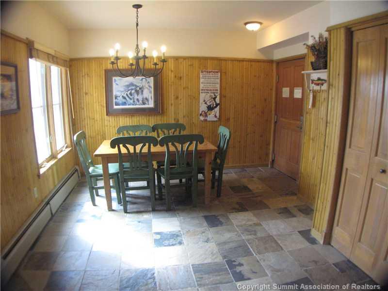 195 River Run Road, Unit 8053 Keystone, CO 80435 - Photo 5 of 16 a view of a dining room with furniture