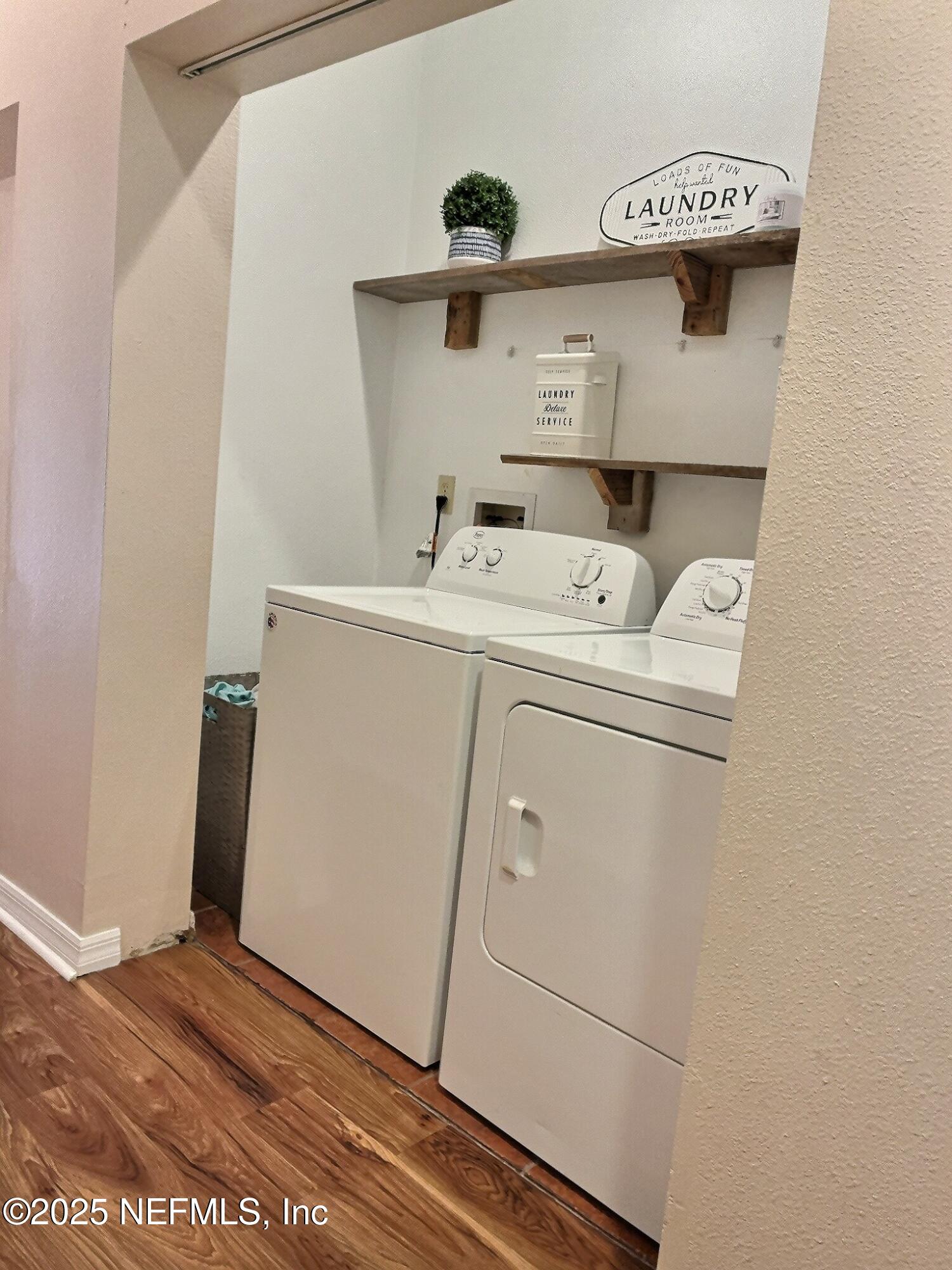 224 Crocus Lane Hawthorne, FL 32640 - Photo 38 of 58 a utility room with dryer and washer