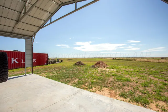 a view of ocean with a yard