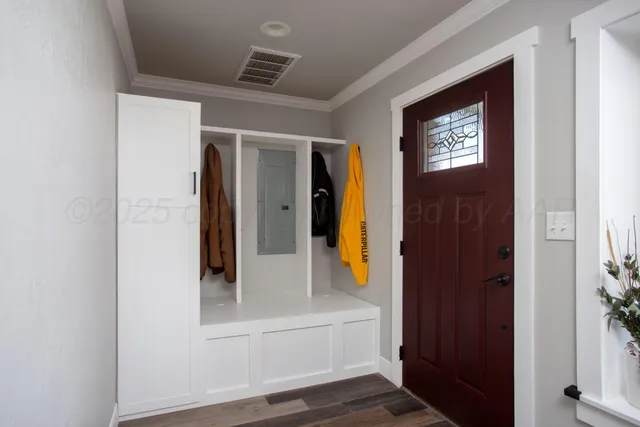 hallway with wooden floor and stairs