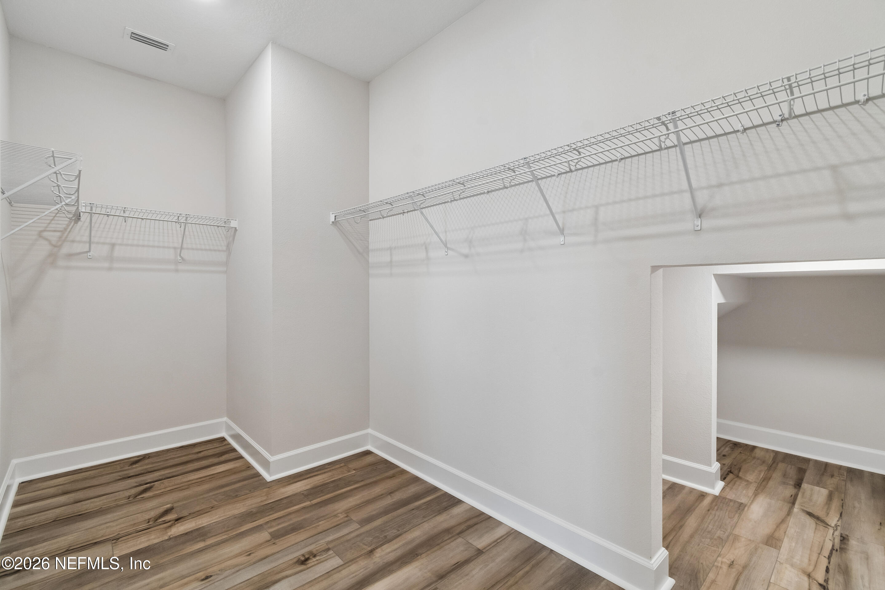 75751 Bayley Place Yulee, FL 32097 - Photo 26 of 28 a view of an empty walk in closet